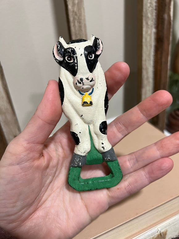Midwest importers cast iron cow bottle opener