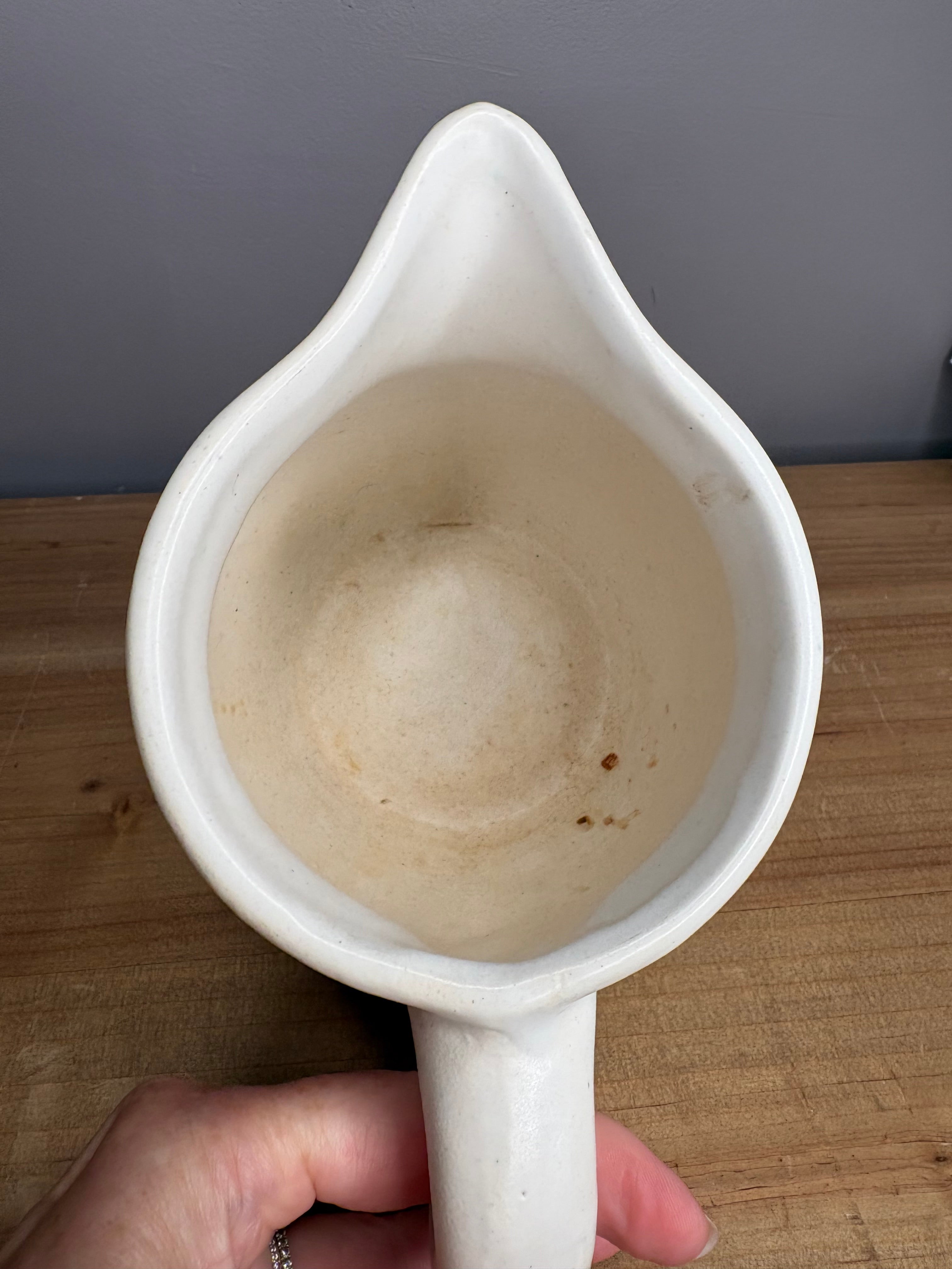 Unmarked Primitive White Pitcher